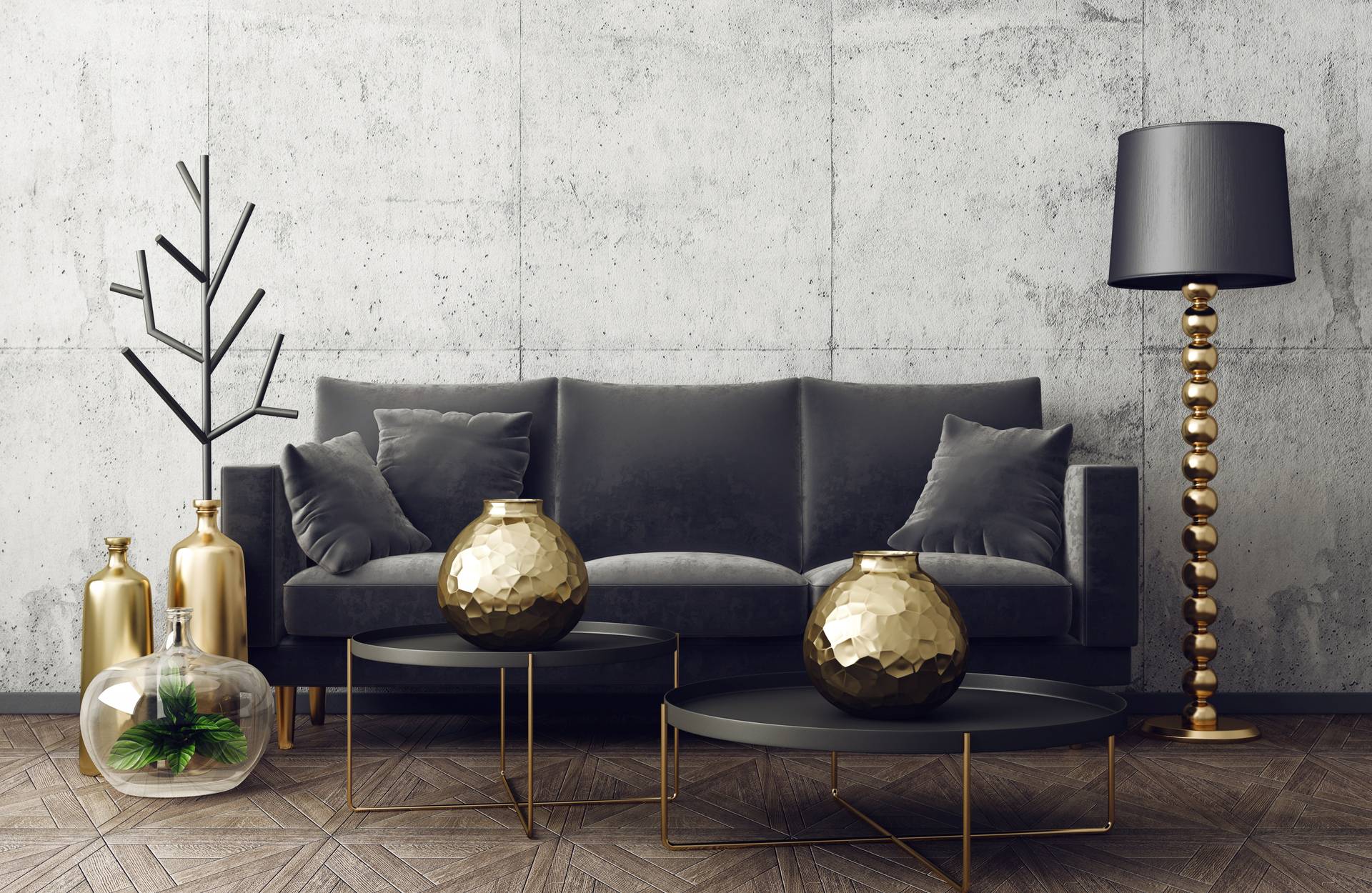 Charcoal 3-seater sofa surrounded by gold decorations