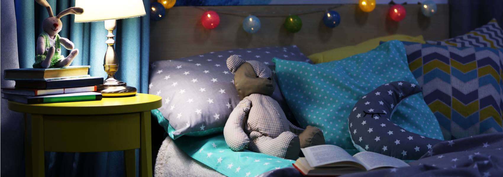 Child's bed with teddy bear